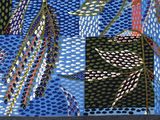 an image of a patchwork quilt with blue, green, and black designs