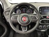 the interior of a small car with a steering wheel and gauges