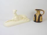 two vases sitting next to each other on a table