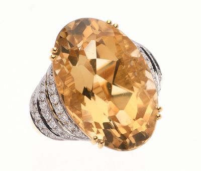 BAGUE en or jaune 750 °/°° centrée d'une citrine ovale pesan…