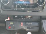 a car dashboard with a car radio and other electronics in it
