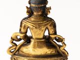 an image of a statue of a woman sitting in a lotus position