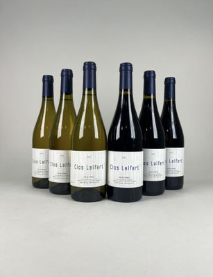 six bottles of wine are lined up in a row