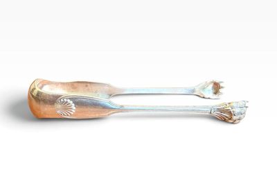 pair of silverware spoons on a white background