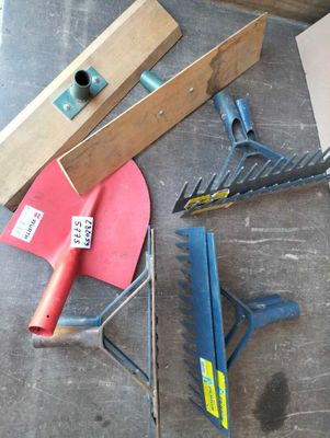 a lot of tools that are laying out on the floor