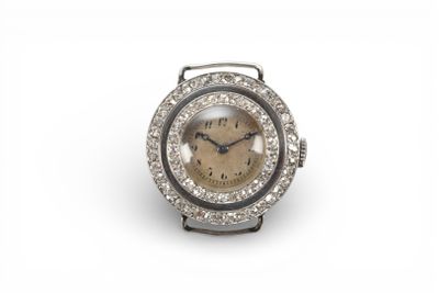 MONTRE en platine 850 millièmes à cadran rond pavé de deux l…