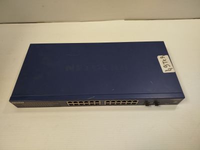 a close up of a blue box on a white surface