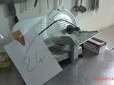 a cutting machine that is sitting on a counter