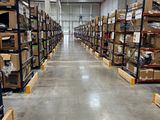 a large warehouse filled with lots of boxes and pallets