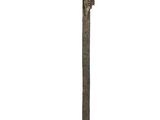 une image représentant une statue d'une personne sur un poteau