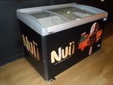 an ice cream machine that is sitting on the floor