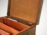 a small wooden box with three compartments inside of it