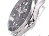 a close up of a watch on a metal bracelet