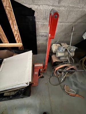 a picture of a room with a lot of stuff on the floor