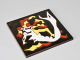 a tile with a picture of a clown on it