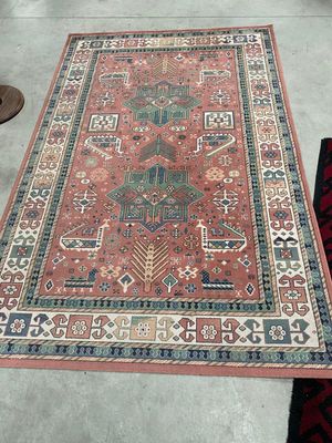 a rug on the floor in a room