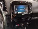 the dashboard of a car with a digital display in the center