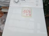 an image of a washing machine sitting on top of a table