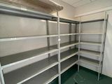 a room with a shelf and shelves in it