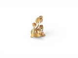 a gold plated figurine of a cat and a dog
