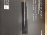 packaging of a black box containing a wii remote and a wii controller