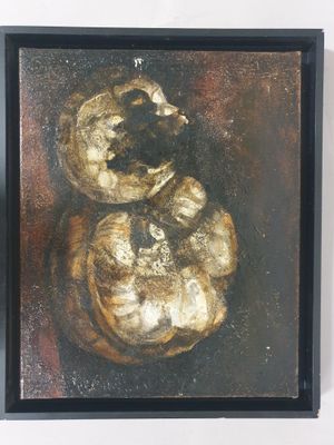 painting of a couple of mushrooms in a black frame on a white wall