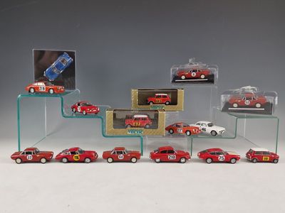a lot of toy cars that are sitting on a shelf