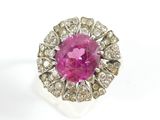 an image of a pink sapphire and diamond ring on a white background