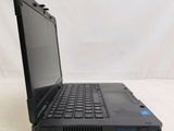 a black laptop computer sitting on a white surface