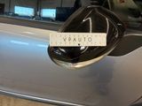 a sticker on the door handle of a car
