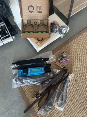 a box that is sitting on the floor next to a pair of scissors