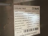 a label on the side of a refrigerator that says cooling table rchs