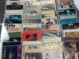 a lot of cd ' s that are on a table