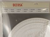 a picture of a decorative white plate in a package
