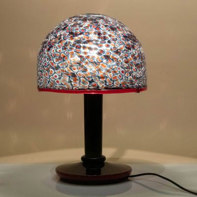 a lamp that is on top of a table