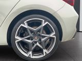 a close up view of a car ' s wheels and rims