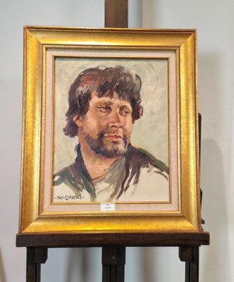 tableau représentant un homme barbu, dans un cadre doré