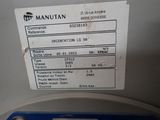 a close up of a label on a machine that says manutan