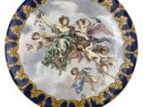 an image of a plate with a painting of angels on it