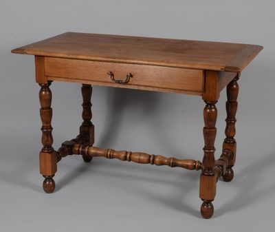 a small table with a drawer on top of it