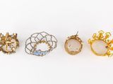 three pairs of gold and diamond rings