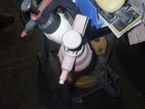 a motor scooter that has a lot of items on it