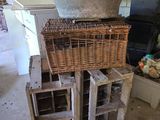 a large pot sitting on top of a stack of crates