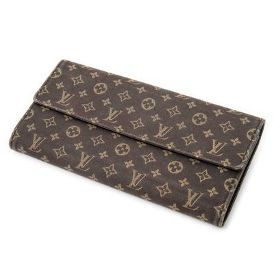 LOUIS VUITTON - PORTEFEUILLE modèle " Sarah " en toile Monog…
