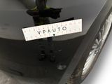 a sticker on the hood of a car that says vauto