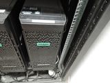 two computers sitting on top of each other in a rack