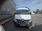 a white van that is parked in a parking lot