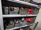 a shelf full of assorted items in a room