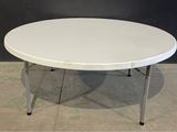 an image of a white table in a room
