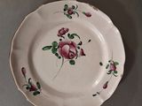 three plates that are sitting on a table